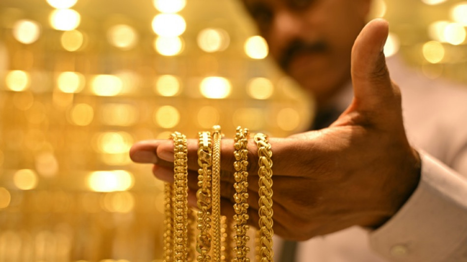 Asia markets edge up as precious metals surge