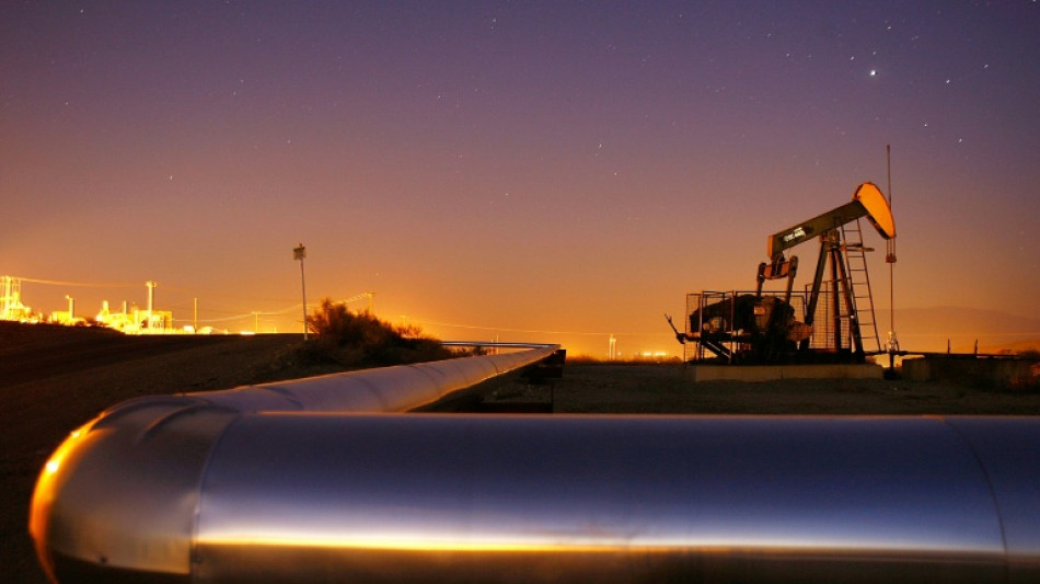 Oil extends losses as Trump flags Venezuela shipments, stocks mixed