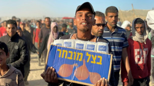 Saqueo de un almacén del Programa Mundial de Alimentos en Gaza